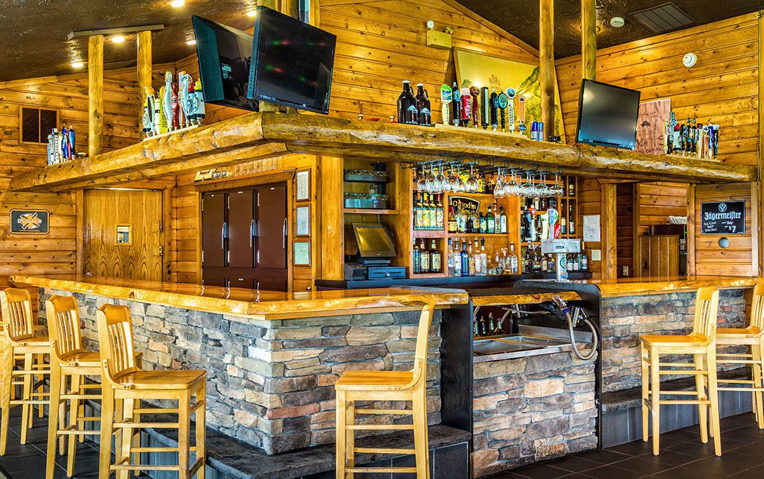 the bar at Legends on the Hill with fully stocked bar and flat screen TVs