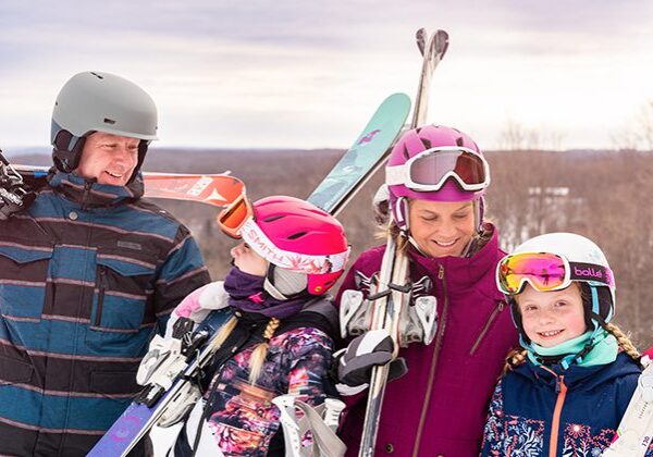 Family enjoying a winter vacation at Treetops Resort